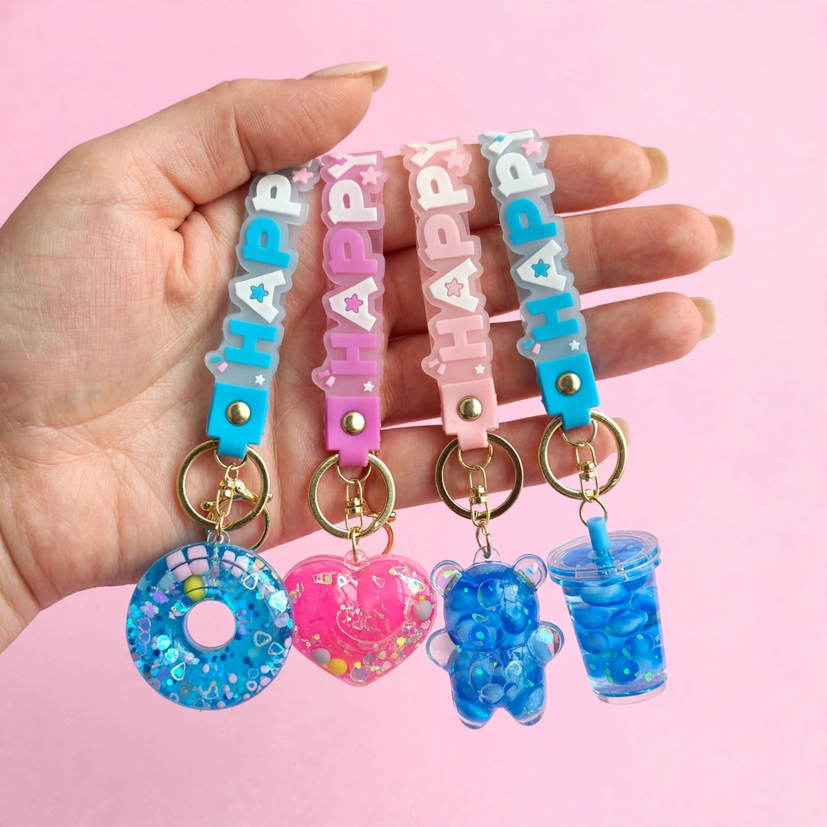 Llaveros de figuras con agua y glitter