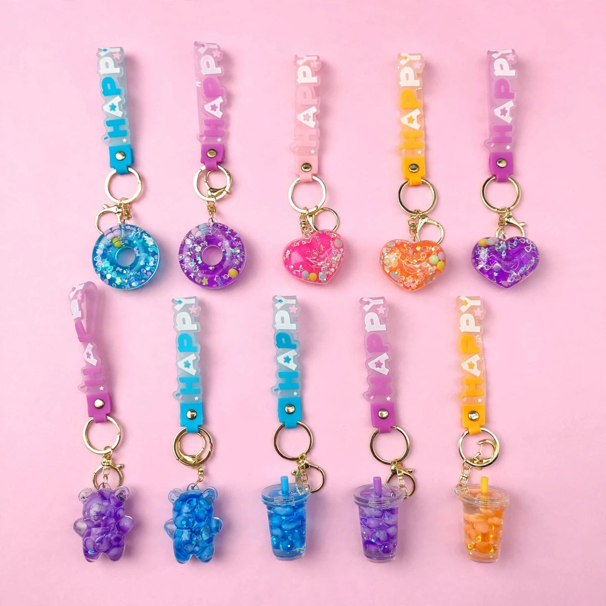 Llaveros de figuras con agua y glitter