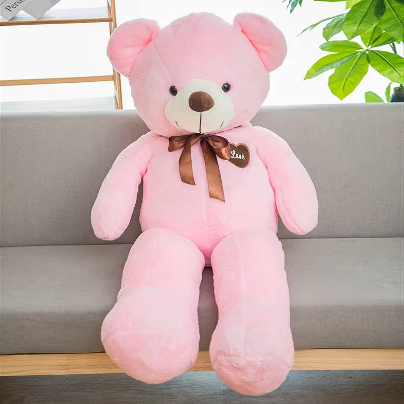 Peluche con cobija de oso