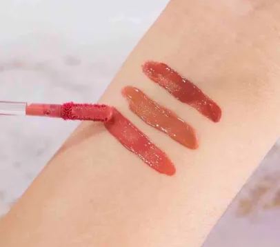 LIP GLOSS + TINTA VEL VET BLOOMSHELL