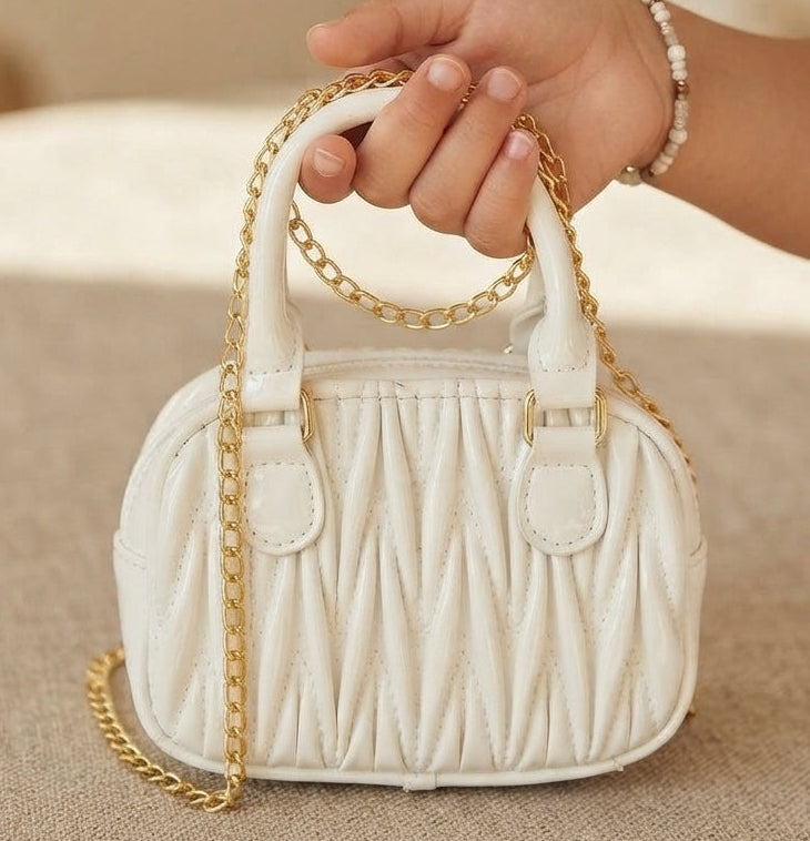 Mini bolsos de mano de niña