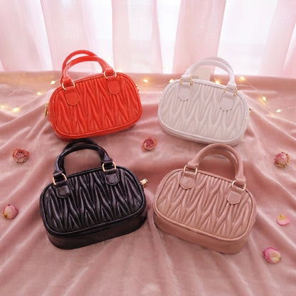 Mini bolsos de mano de niña